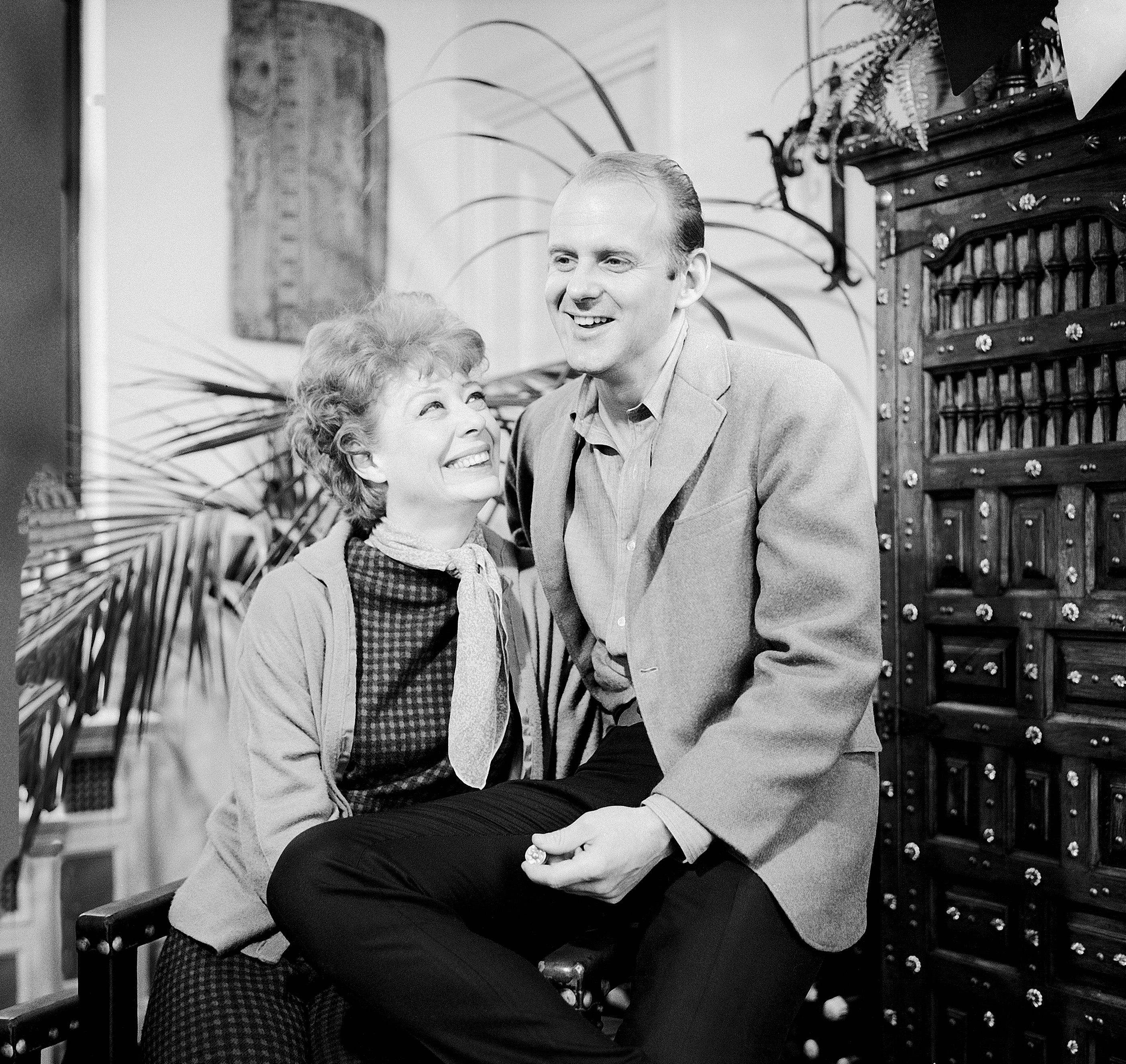 Gwen Verdon and Bob Fosse sitting together.