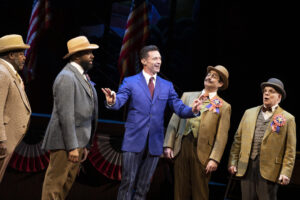 Phillip Boykin, Nicholas Ward, Hugh Jackman, Daniel Torres, and Eddie Korbich in The Music Man. Photo by Julieta Cervantes.